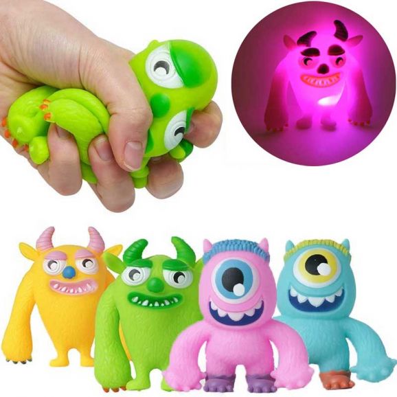 Roligt monster med blinkande ljus klämmonster mjuk